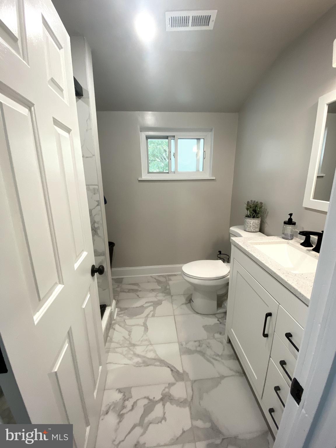 5705 Denfield Road Rockville, MD 20851 - Photo 11 of 14 Upstairs bath