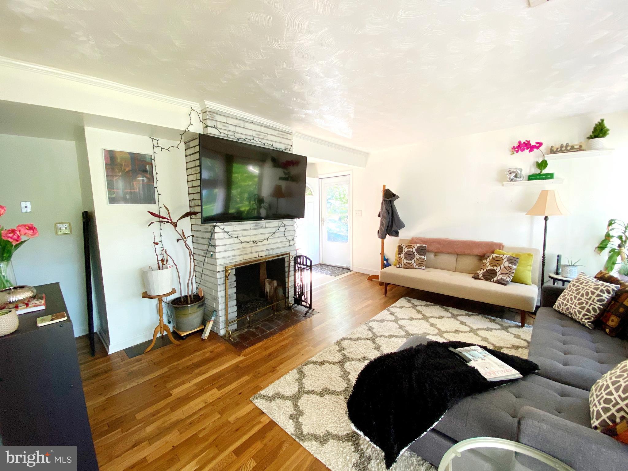 5705 Denfield Road Rockville, MD 20851 - Photo 5 of 14 Living room from backdoor