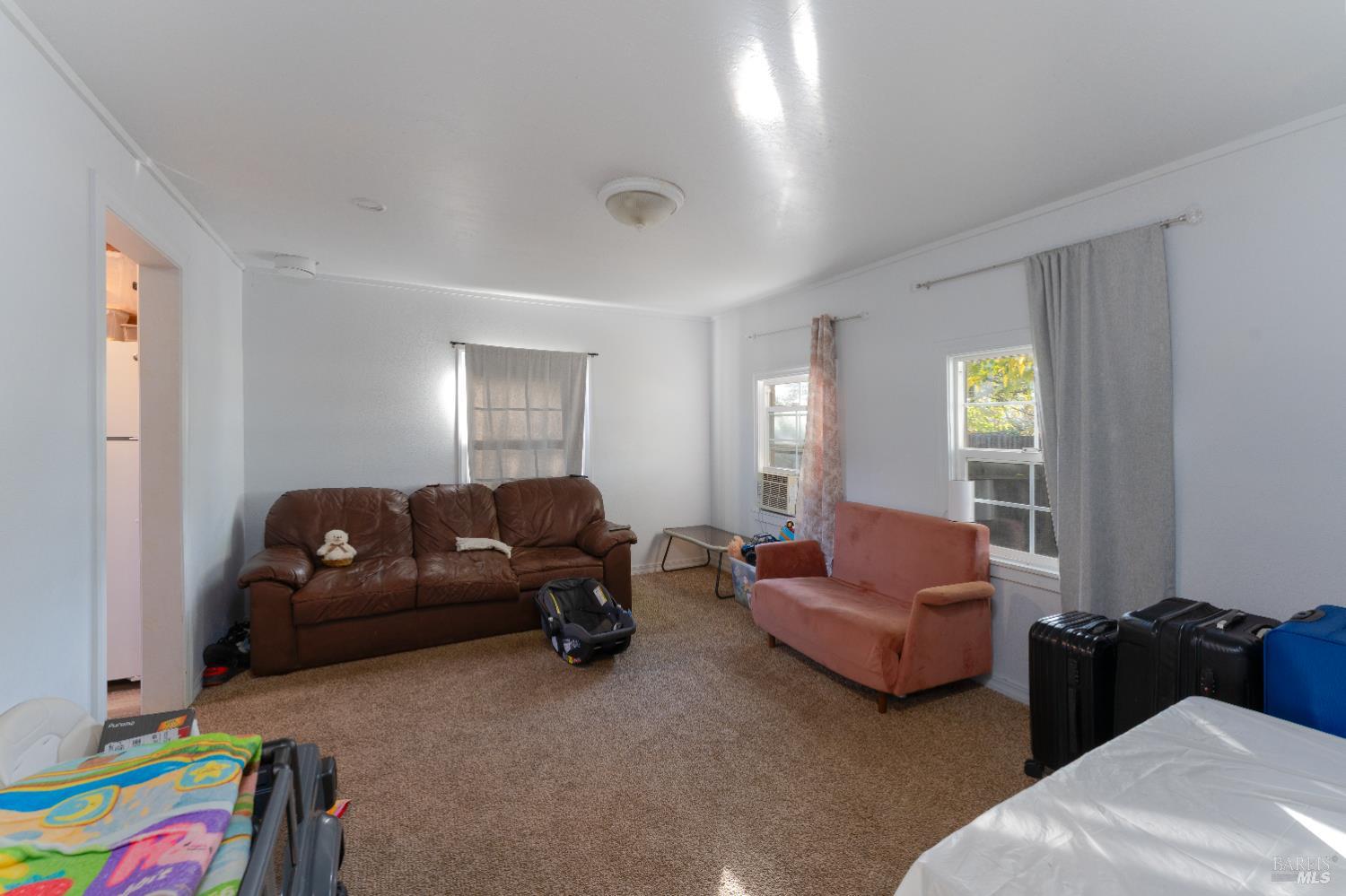 2580 Center Valley Road Willits, CA 95490 - Photo 16 of 43 a living room with furniture and a window