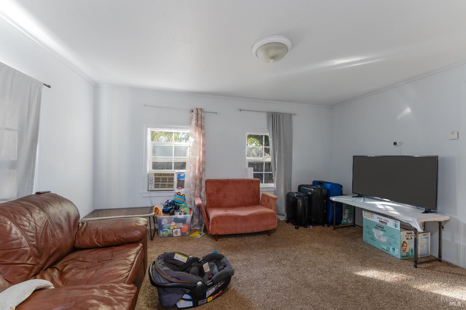 2580 Center Valley Road Willits, CA 95490 - Photo 17 of 43 a living room with furniture and a flat screen tv