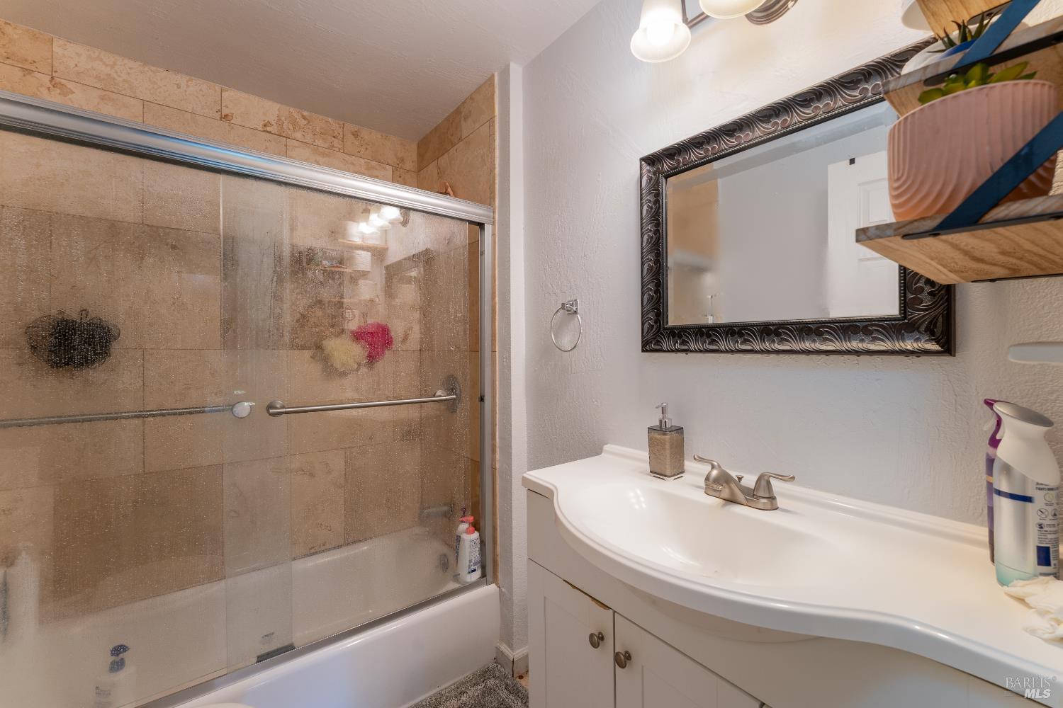 2580 Center Valley Road Willits, CA 95490 - Photo 22 of 43 a bathroom with a sink mirror and shower