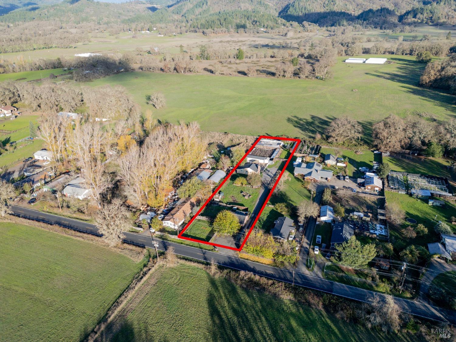 2580 Center Valley Road Willits, CA 95490 - Photo 32 of 43 a view of a lake with a mountain