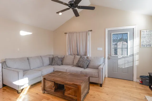a living room with furniture and a couch