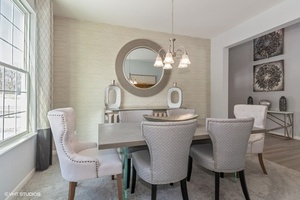3622 Edelweiss Road Elgin, IL 60124 - Photo 2 of 11 a view of a dining room with furniture and chandelier
