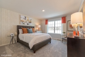 3622 Edelweiss Road Elgin, IL 60124 - Photo 11 of 11 a spacious bedroom with a bed and a large window