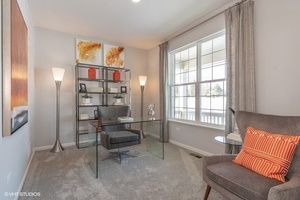3622 Edelweiss Road Elgin, IL 60124 - Photo 3 of 11 a living room with furniture and a window