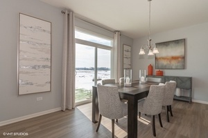 3622 Edelweiss Road Elgin, IL 60124 - Photo 5 of 11 a dining room with furniture and wooden floor