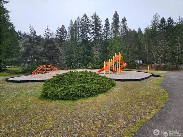 an outdoor space with lots of green space
