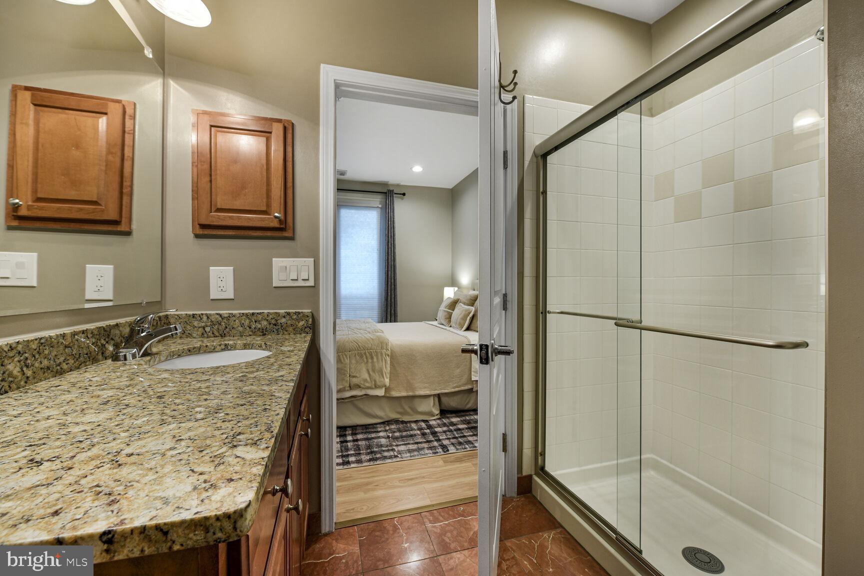 12000 Market Street, Unit 182 Reston, VA 20190 - Photo 14 of 30 Primary Bath with Walk In Closet