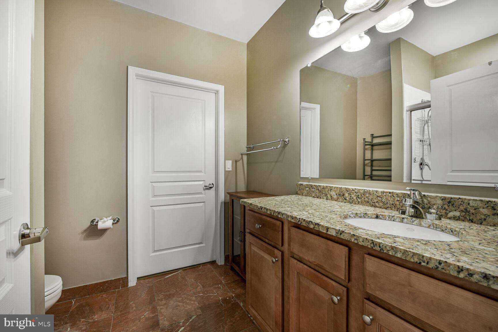 12000 Market Street, Unit 182 Reston, VA 20190 - Photo 15 of 30 Primary Bath with Walk In Closet