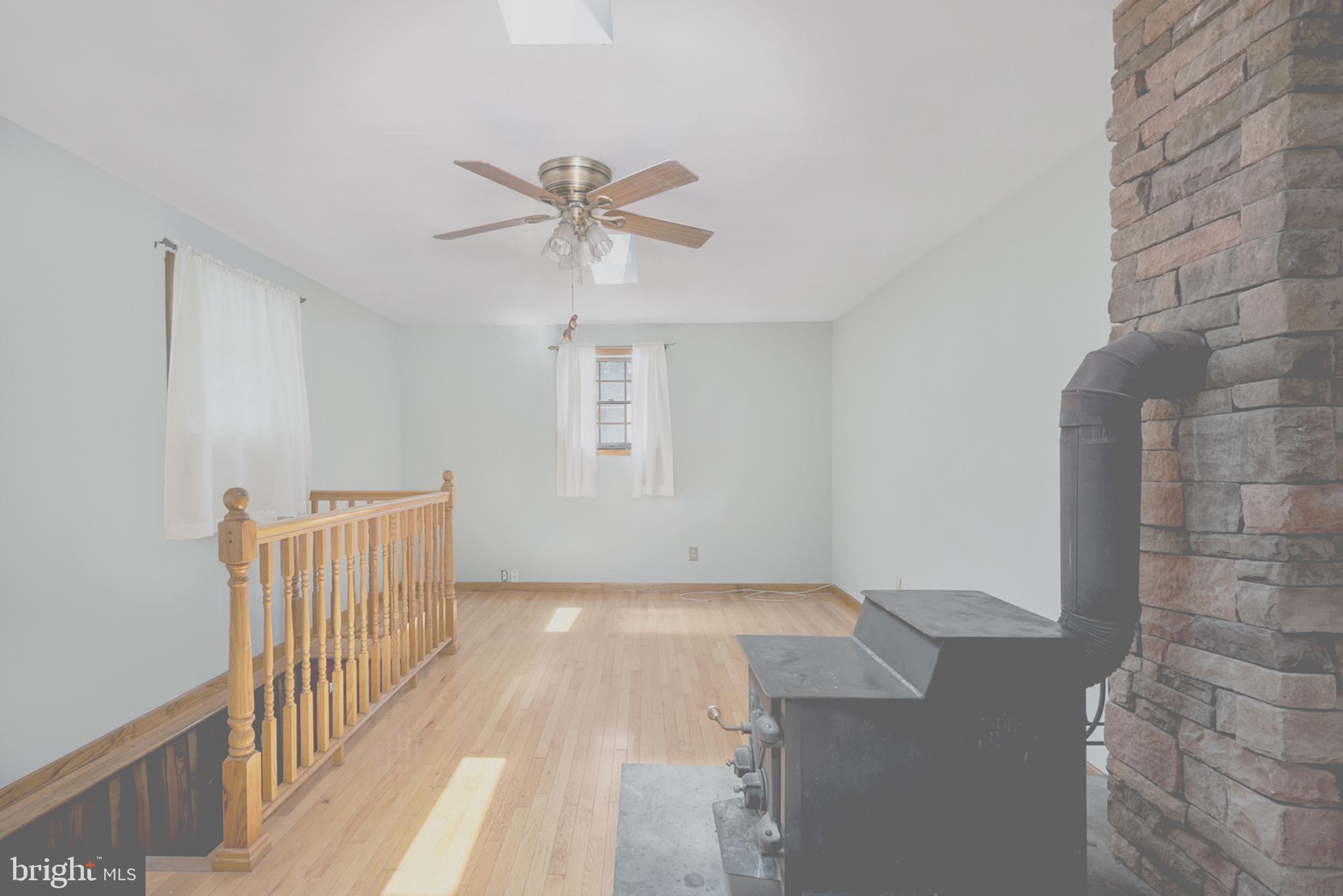 12 Peach Road Elkton, MD 21921 - Photo 6 of 18 FAMILY ROOM/OFFICE W/ WOODSTOVE