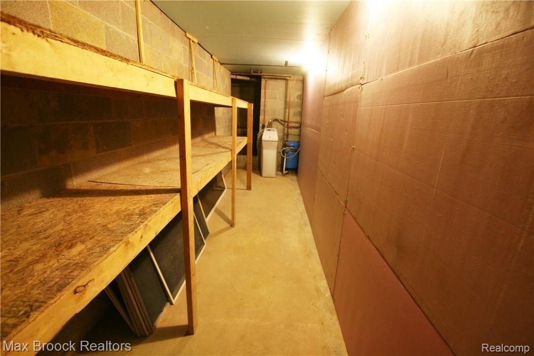 4515 Shepper Road Stockbridge, MI 49285 - Photo 23 of 34 Basement storage