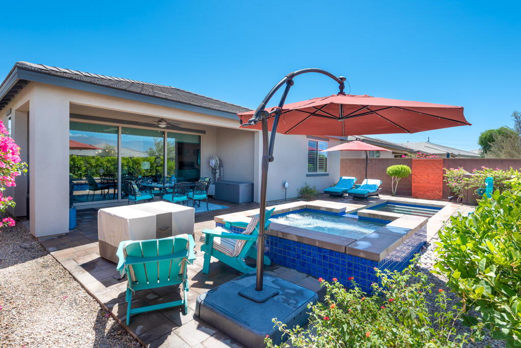 50715 Monterey Cyn Drive Indio, CA 92201 - Photo 31 of 43 a backyard of a house with seating space