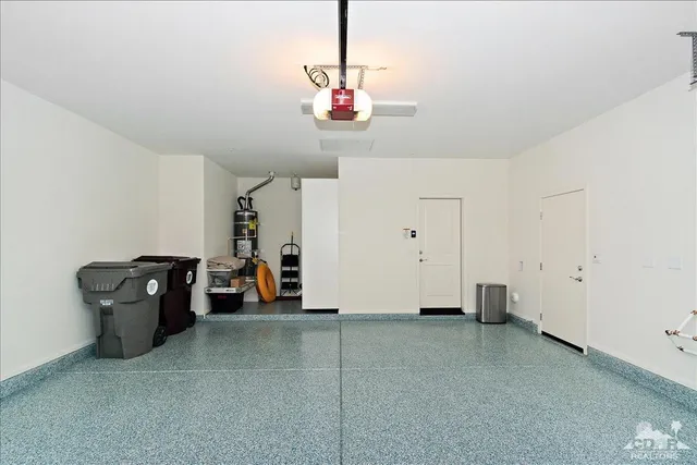 a view of multiple houses with a street