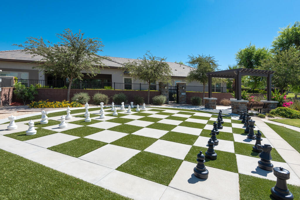 50715 Monterey Cyn Drive Indio, CA 92201 - Photo 38 of 43 a swimming pool with outdoor seating and yard