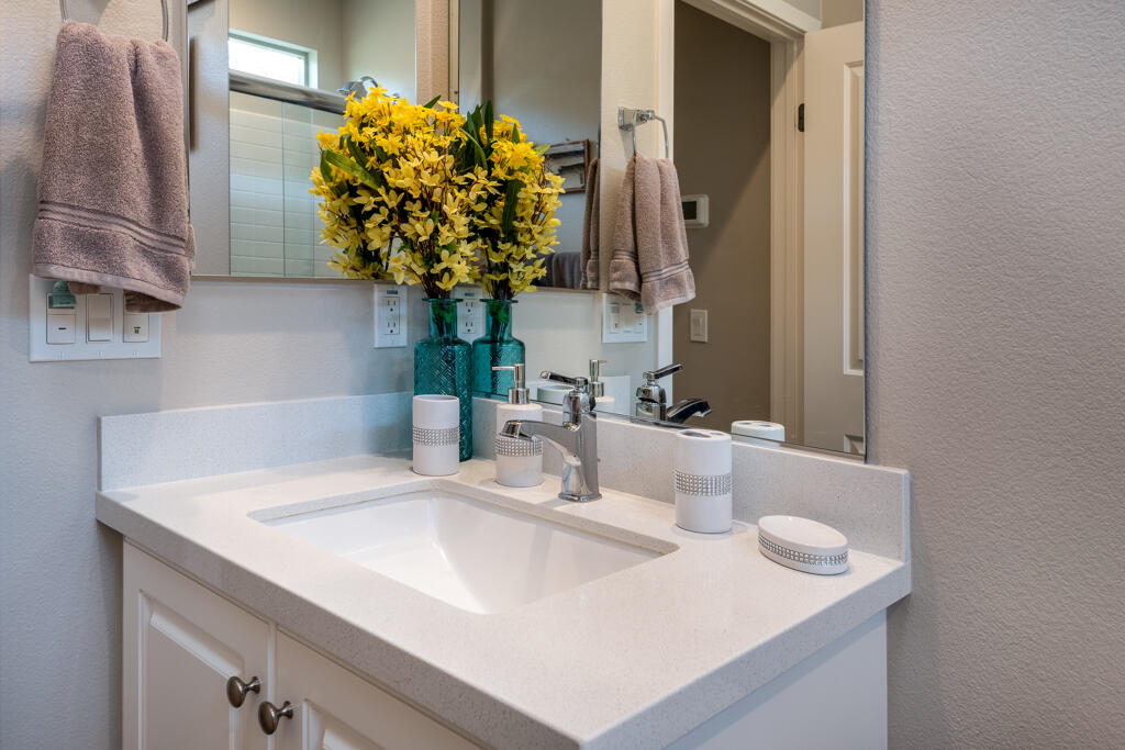 50715 Monterey Cyn Drive Indio, CA 92201 - Photo 9 of 43 a bathroom with a sink and a mirror