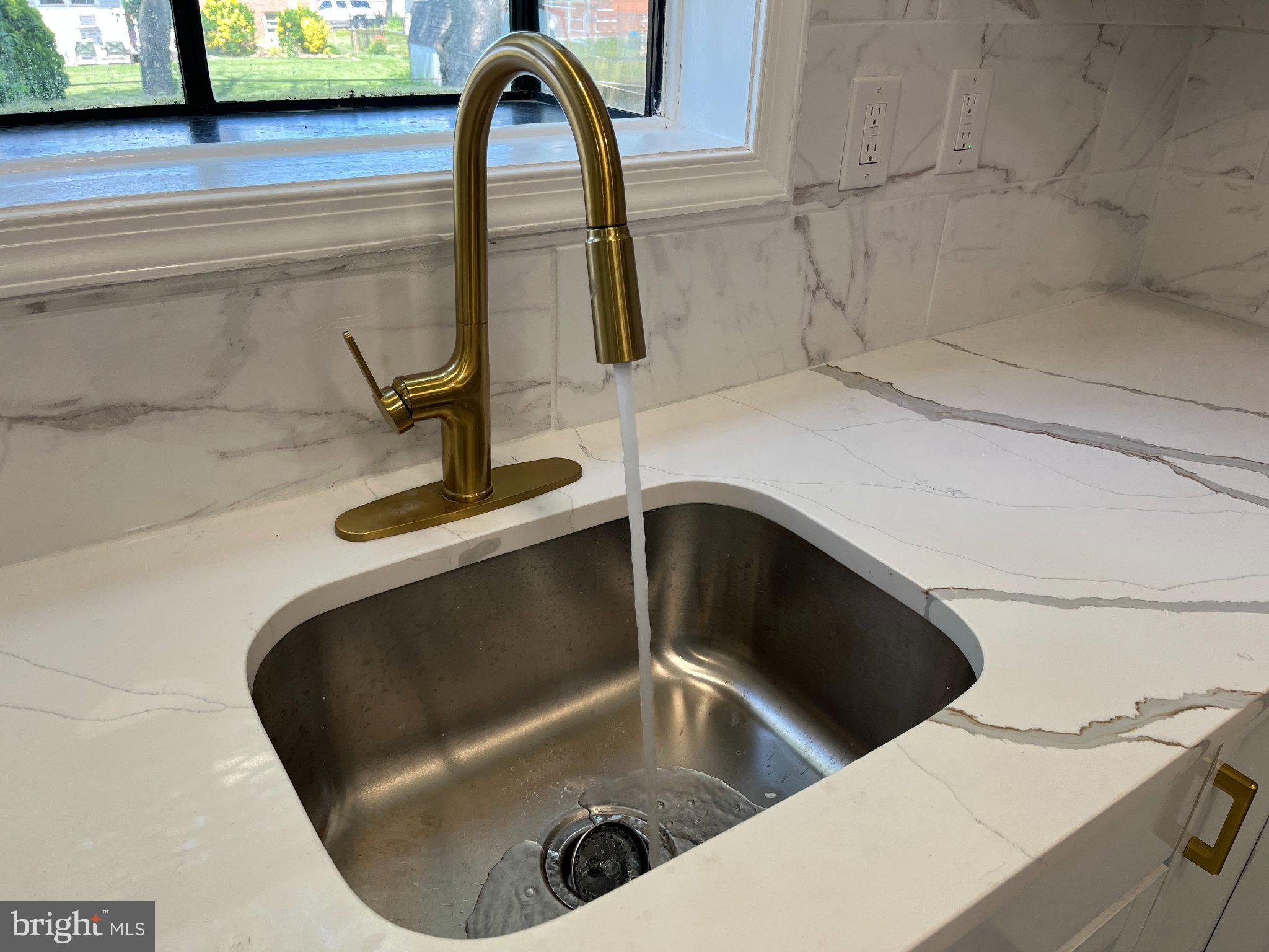 2405 Limestone Road Wilmington, DE 19808 - Photo 14 of 40 a close view of sink and tap