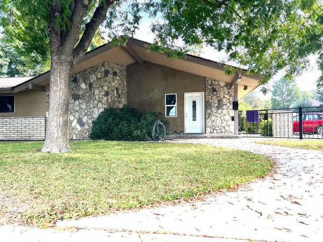 a house view with a outdoor space
