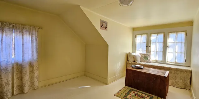 a view of an entryway with sitting area