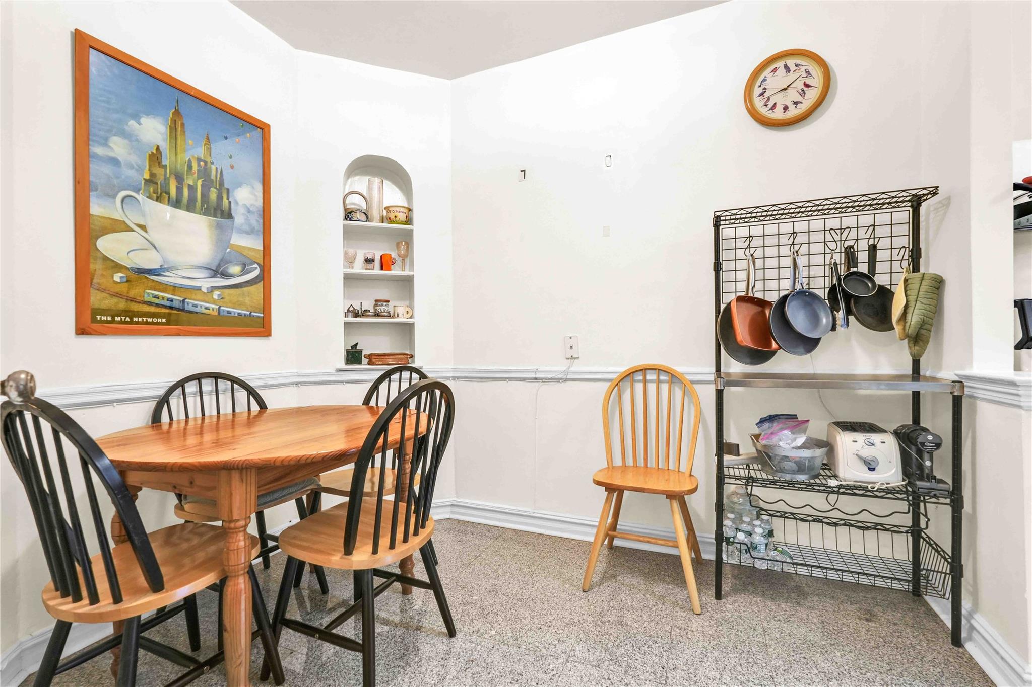 84-51 Beverly Road, Unit 5P Queens, NY 11415 - Photo 12 of 19 Dining area with baseboards