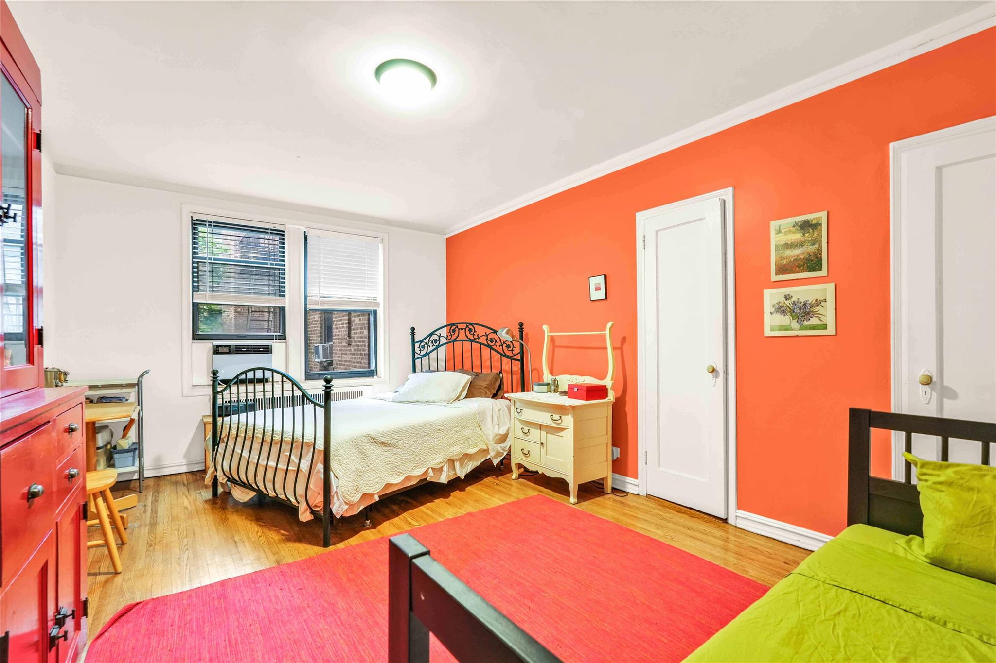 84-51 Beverly Road, Unit 5P Queens, NY 11415 - Photo 14 of 19 Bedroom featuring wood finished floors and crown molding