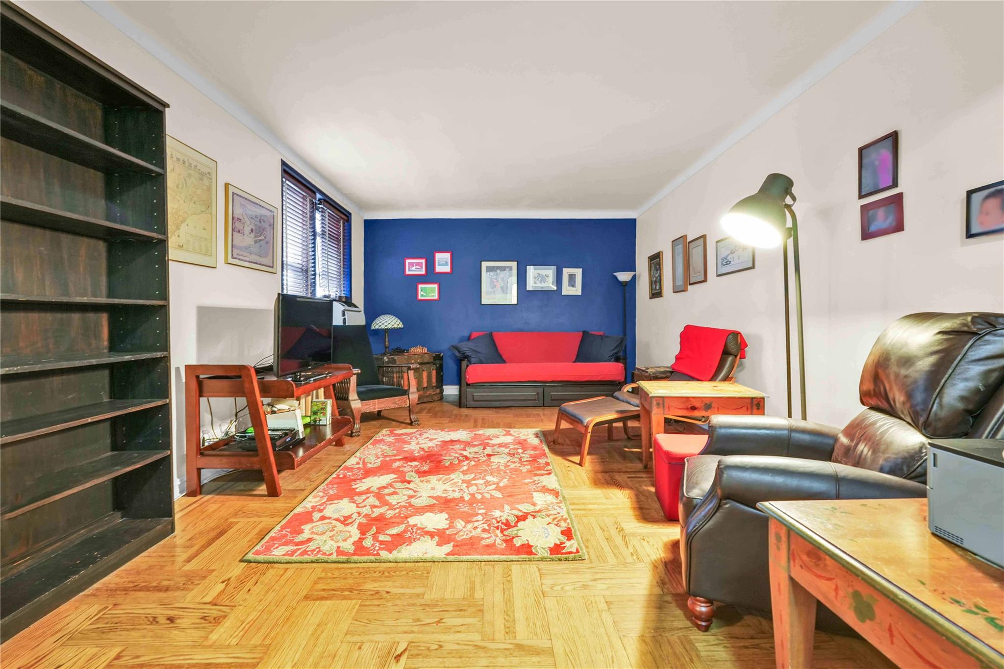 84-51 Beverly Road, Unit 5P Queens, NY 11415 - Photo 7 of 19 Living room featuring crown molding