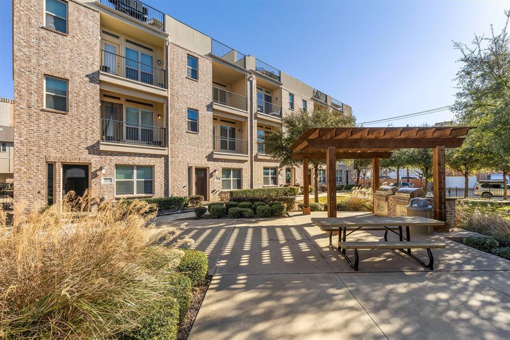 a view of a building with sitting area