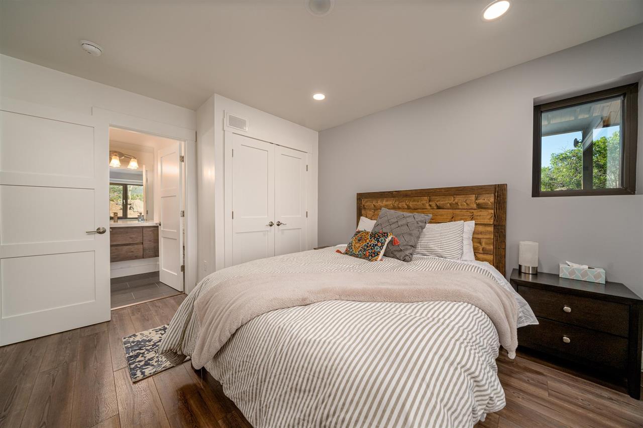 408 Coyote Run Mesa, CO 81643 - Photo 12 of 35 a bedroom with a bed and a window