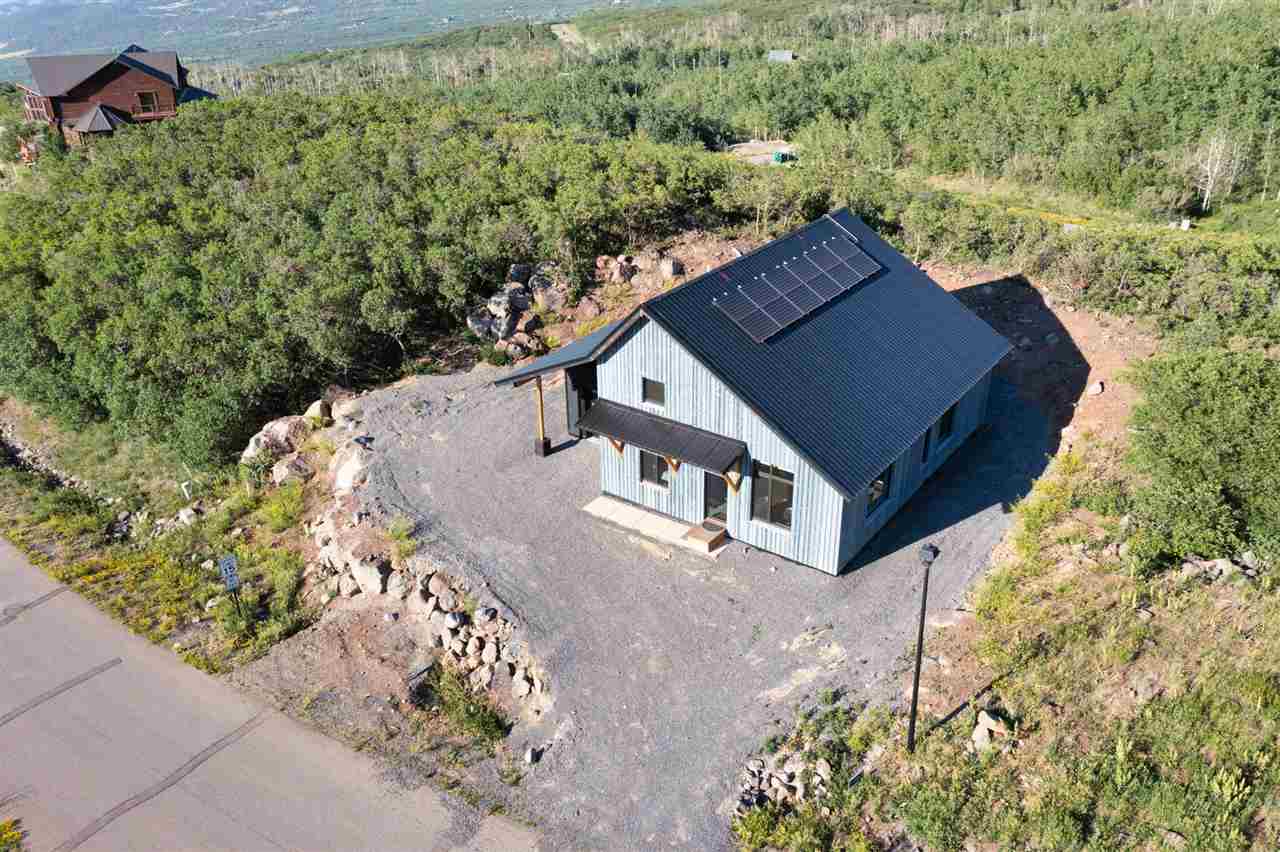 408 Coyote Run Mesa, CO 81643 - Photo 2 of 35 a view of a house with a yard