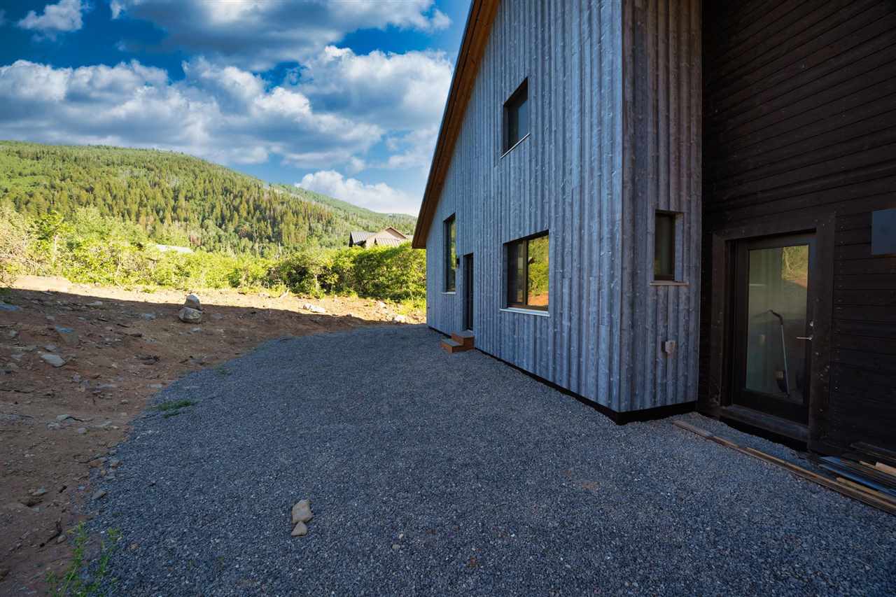 408 Coyote Run Mesa, CO 81643 - Photo 30 of 35 a view of an empty room with a fireplace