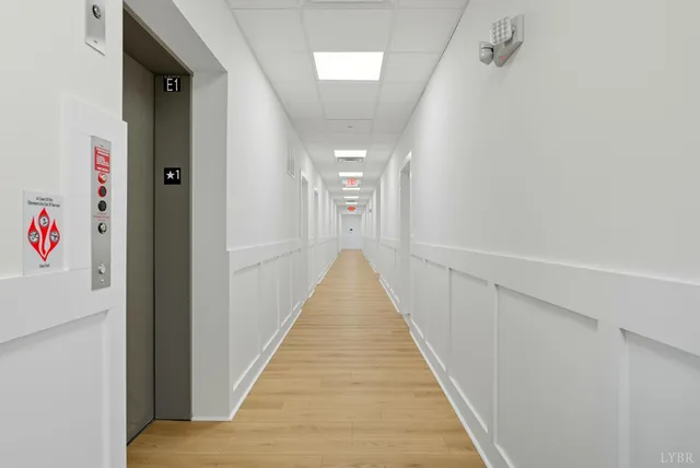 a view of a hallway with staircase