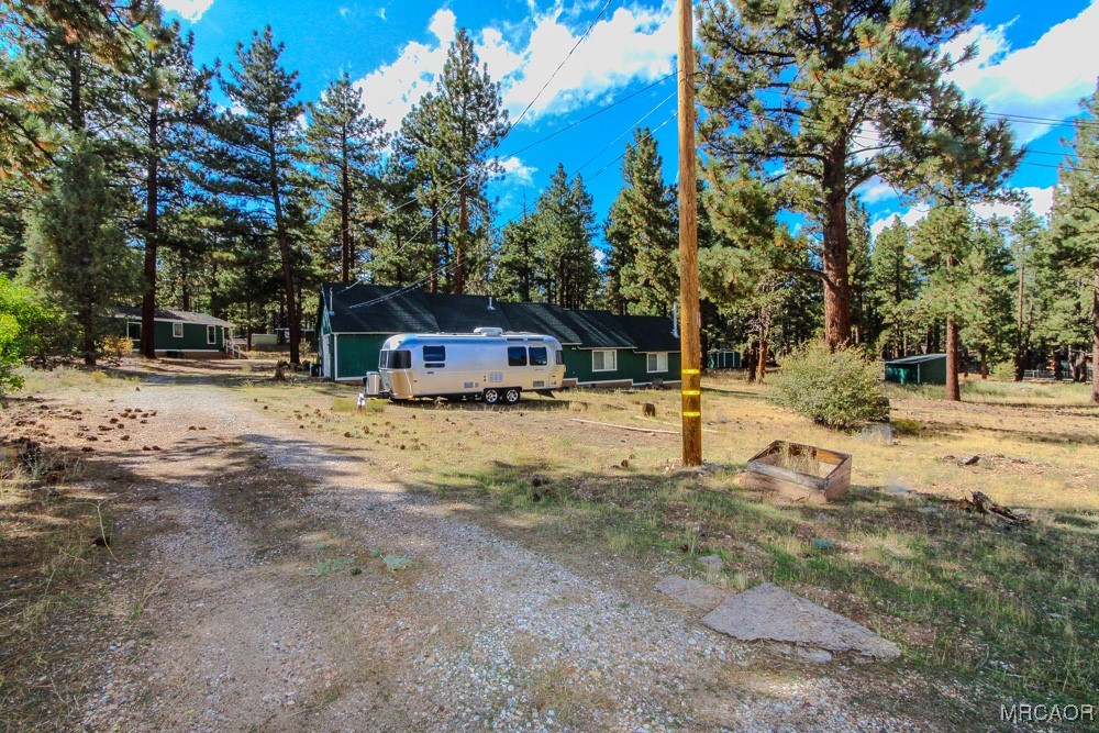 1197 Mitchell Lane Big Bear City, CA 92386 - Photo 1 of 32 a view of swimming pool with a patio