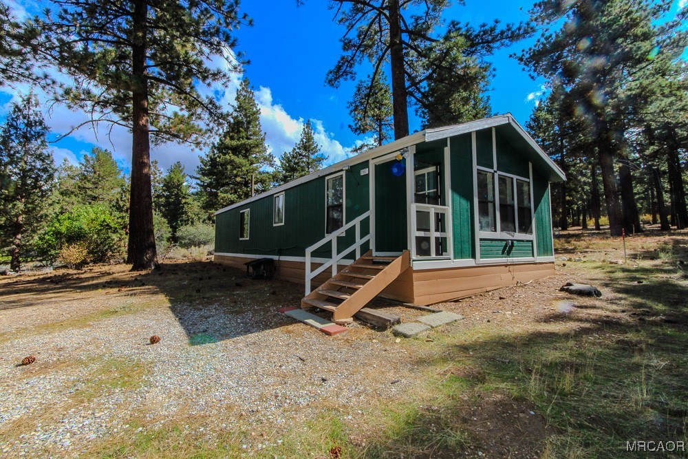 1197 Mitchell Lane Big Bear City, CA 92386 - Photo 2 of 32 a view of a house with backyard