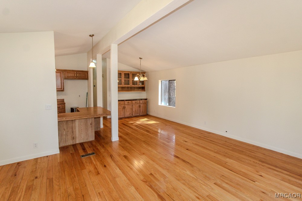 1197 Mitchell Lane Big Bear City, CA 92386 - Photo 3 of 32 a view of empty room with wooden floor