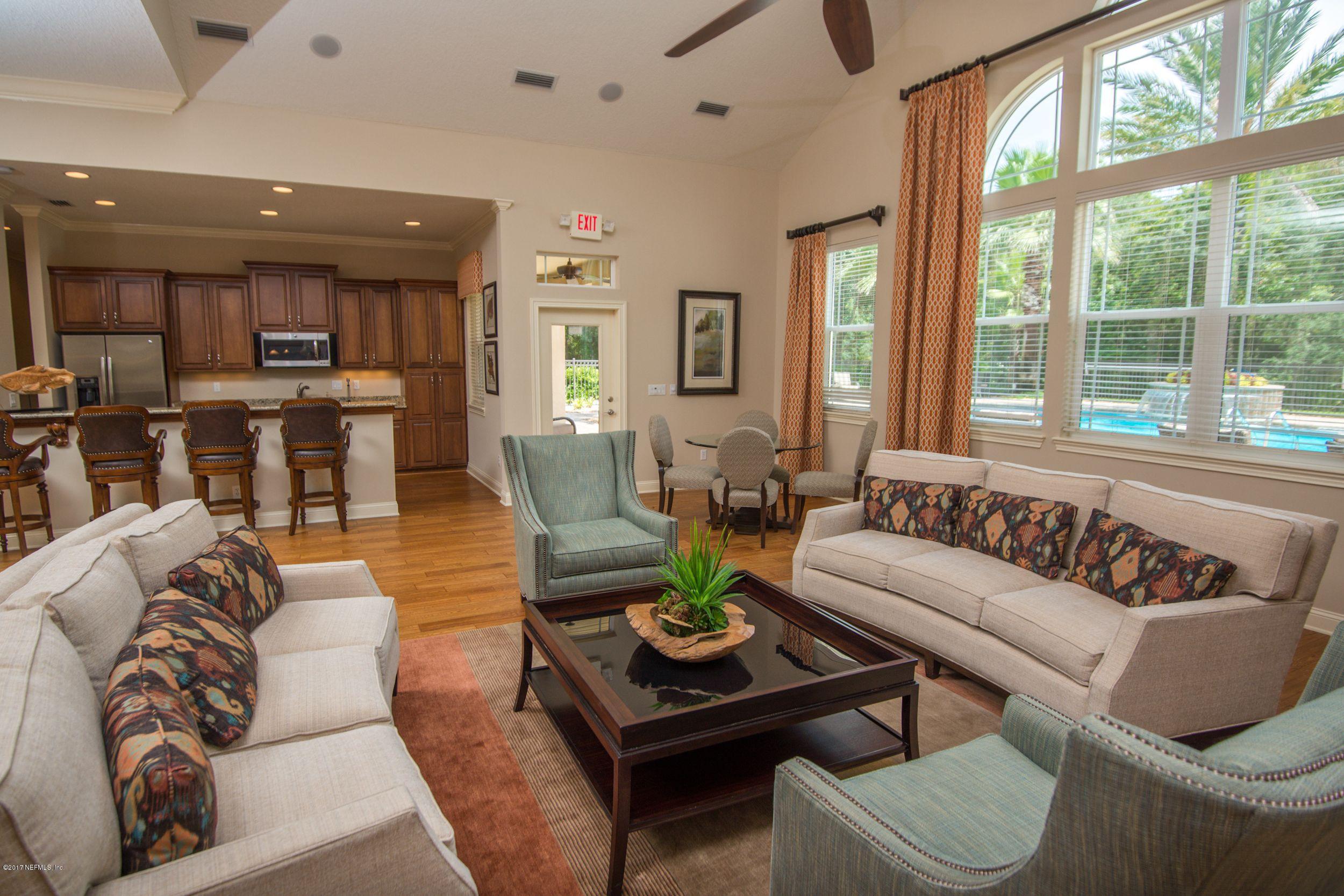 84 Ocale Court St. Augustine, FL 32084 - Photo 15 of 21 a living room with furniture and a large window