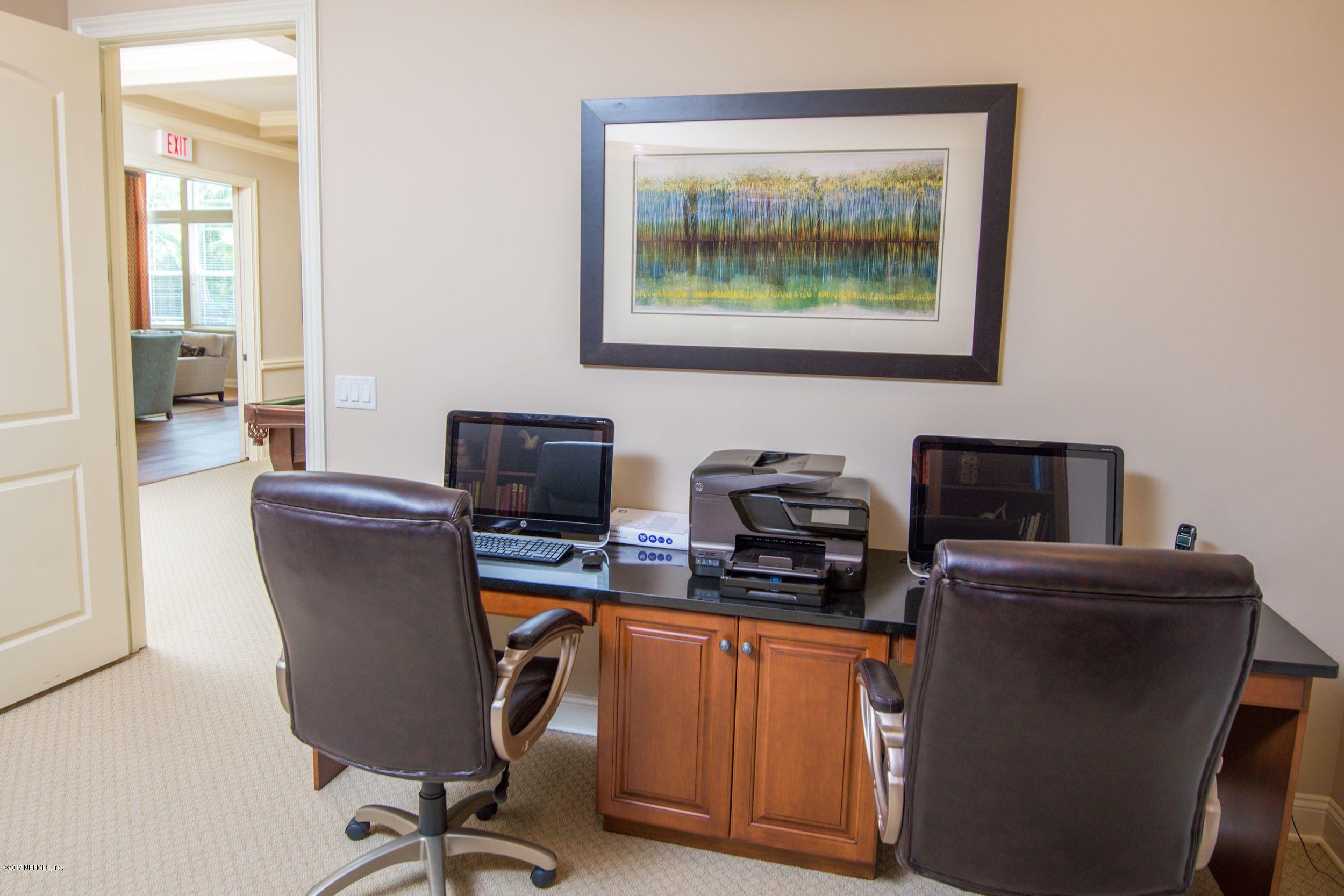 84 Ocale Court St. Augustine, FL 32084 - Photo 17 of 21 a view of a workspace with furniture and a window