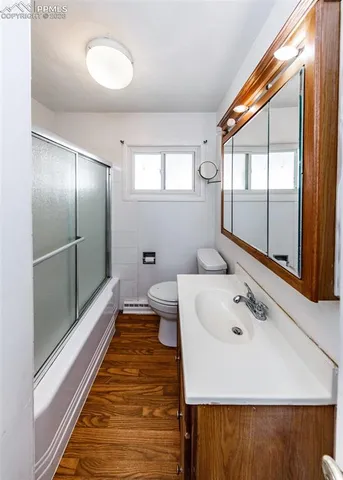 a bathroom with a sink and a large mirror