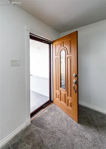 an empty room with window