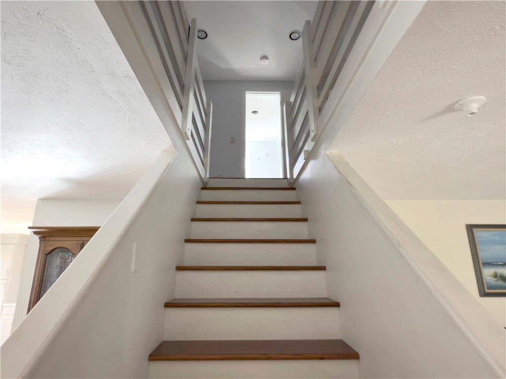 89 Narrow Lane Charlestown, RI 02813 - Photo 26 of 49 Stairs from 1st to 2nd floor