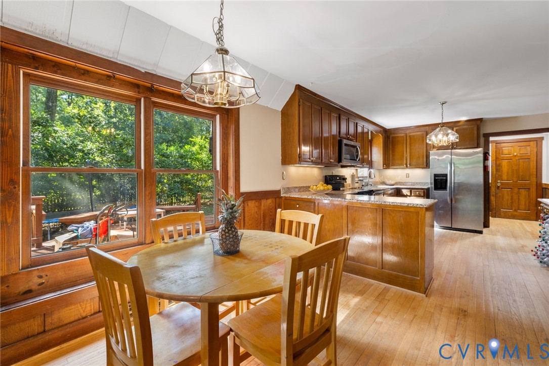 13611 Winterberry Ridge Midlothian, VA 23112 - Photo 12 of 30 Large eat-in kitchen space with wall of windows to