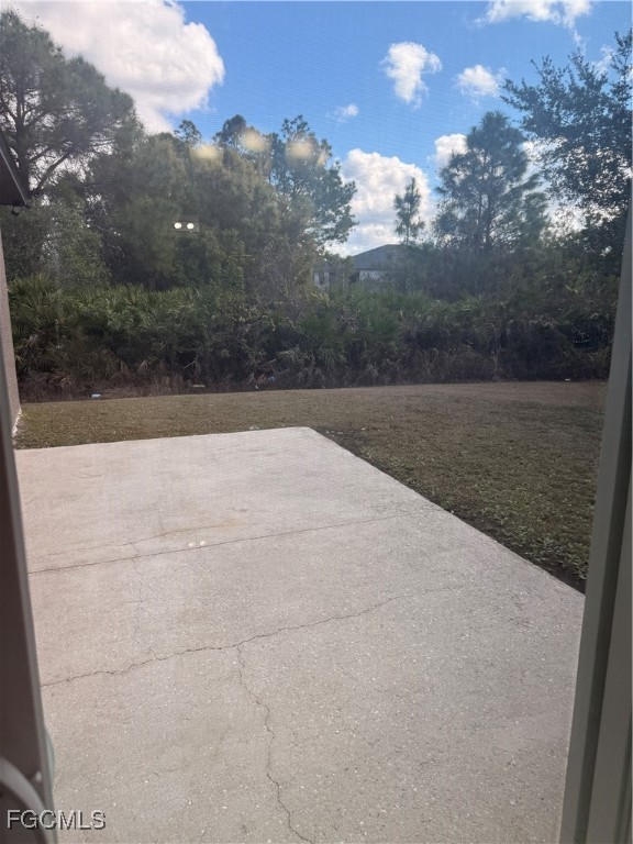 3207 54th Street West Lehigh Acres, FL 33971 - Photo 13 of 13 a view of outdoor space and yard