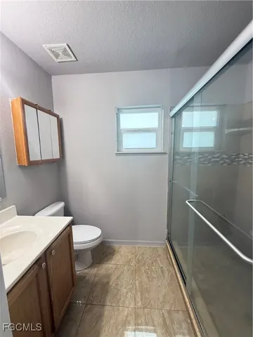 a bathroom with a sink and toilet