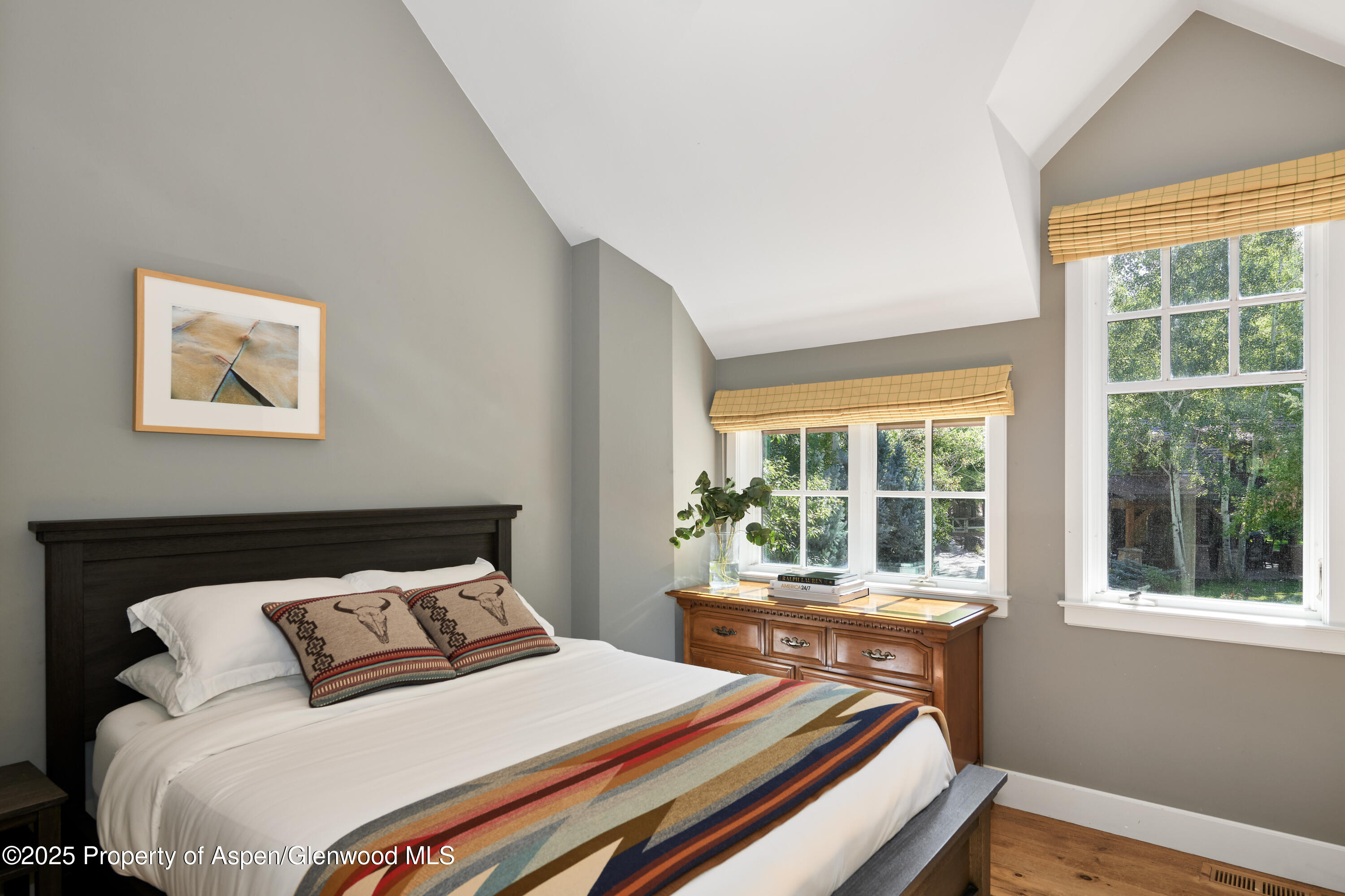 1900-1902 Snowmass Creek Road Snowmass, CO 81654 - Photo 14 of 74 a bedroom with a bed and a window