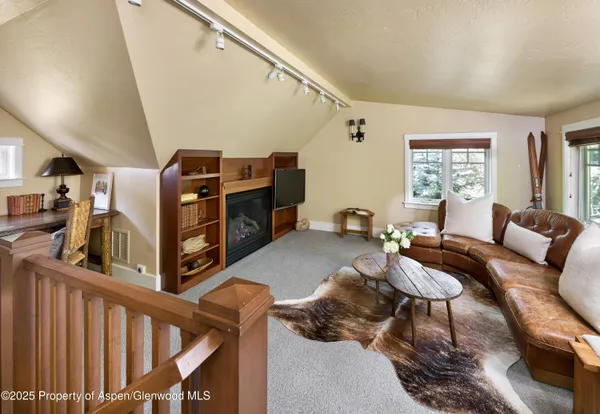a view of balcony with furniture