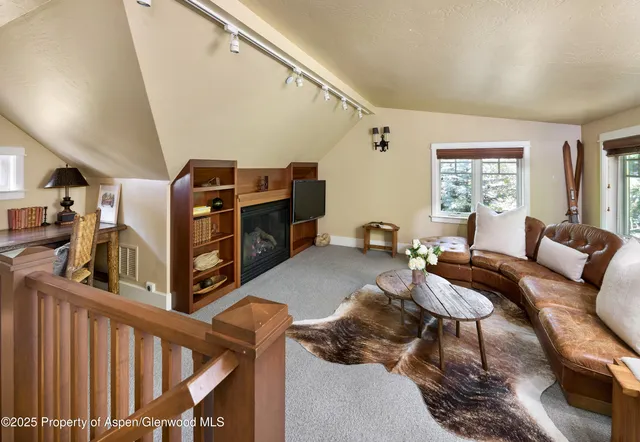 a view of balcony with furniture