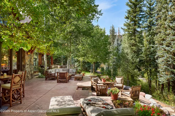 a view of a large building with a mountain in the background