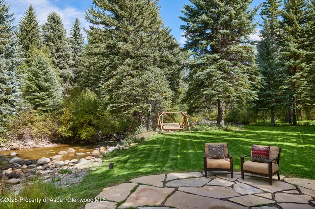 a view of a backyard with a garden