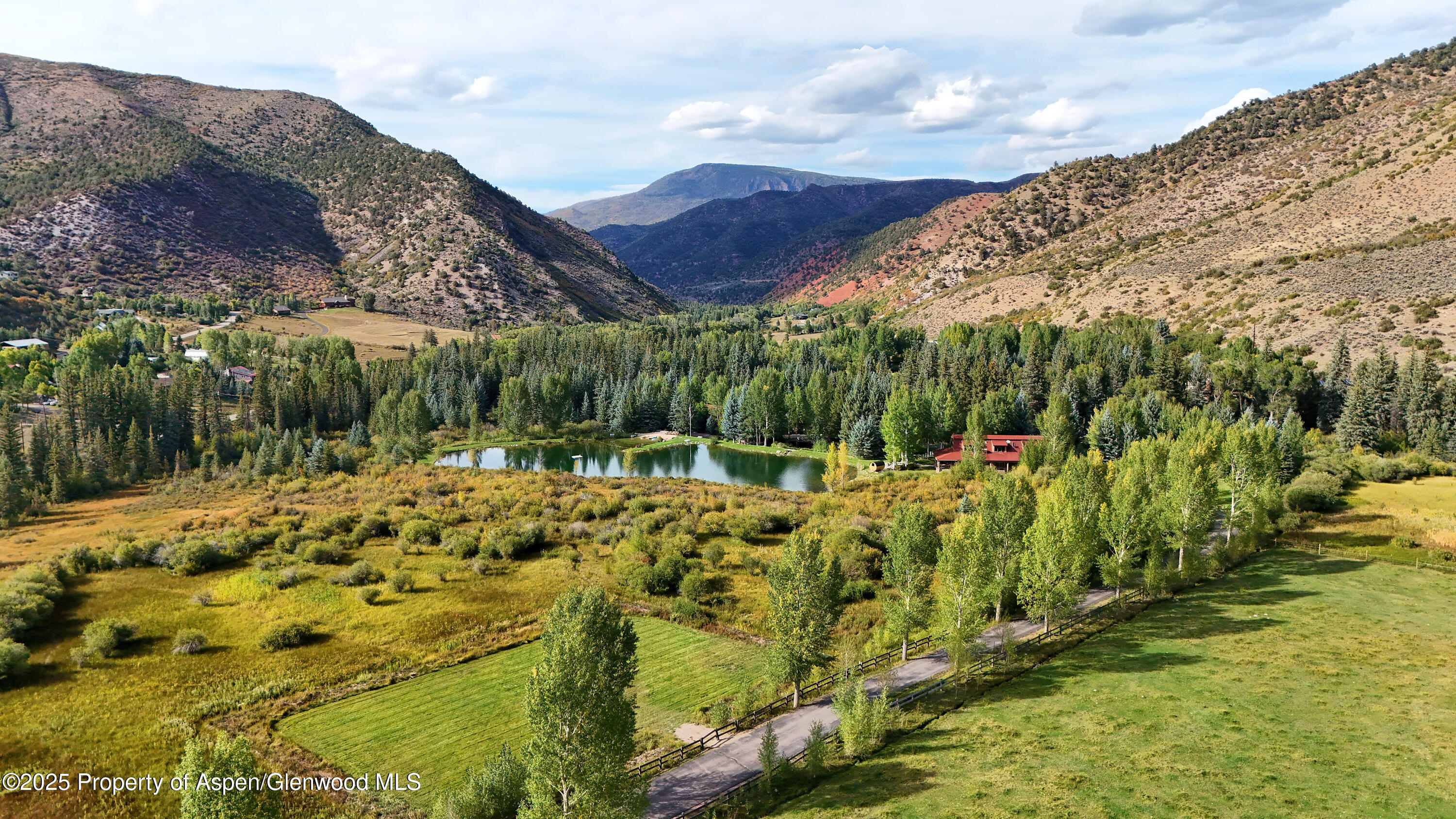 1900-1902 Snowmass Creek Road Snowmass, CO 81654 - Photo 54 of 74 a view of a backyard