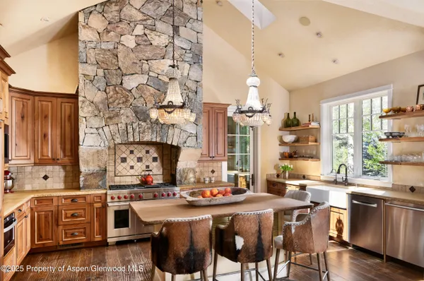 a front view of a house with a trees