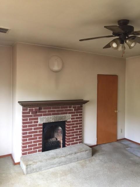 18 1/2 Little Deer Creek Road Cheswick, PA 15024 - Photo 7 of 21 Spacious living room with a lovely fireplace as the focal point. Large closet to the right.